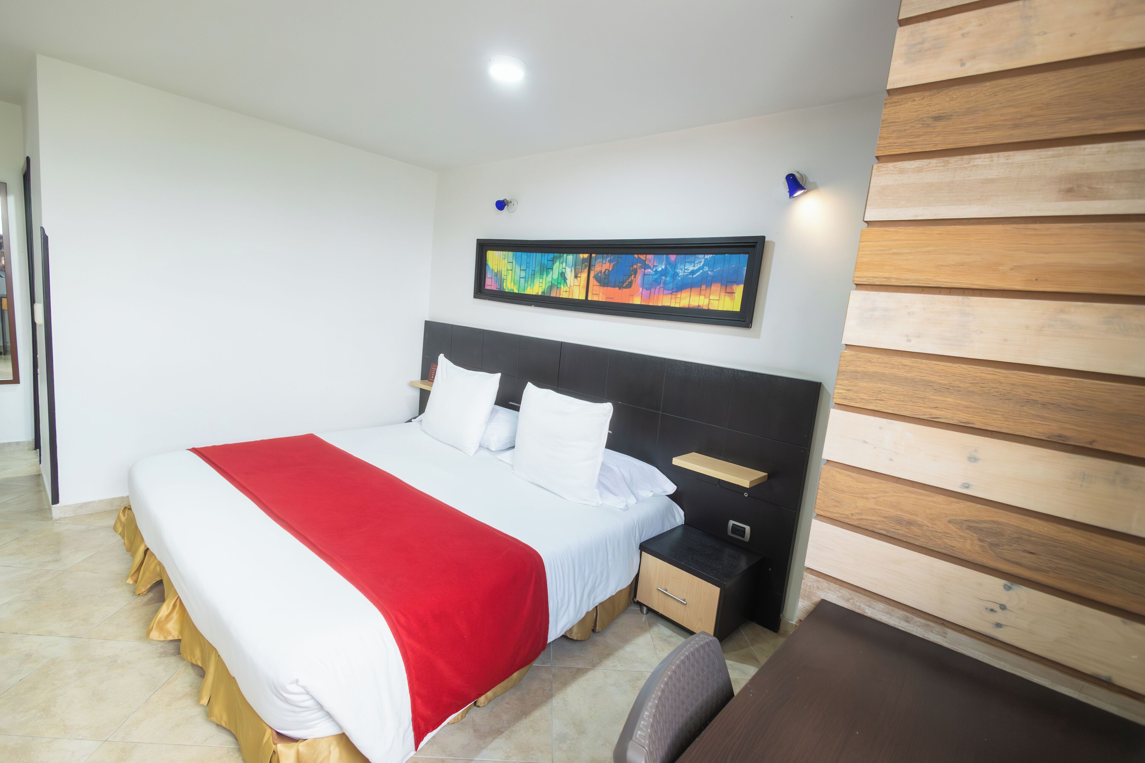 Premium bedding, minibar, blackout curtains, soundproofing