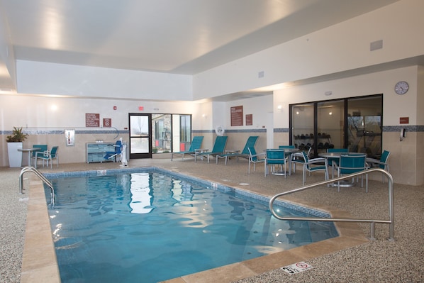 Indoor pool, open 6:00 AM to 11:00 PM, pool umbrellas, pool loungers