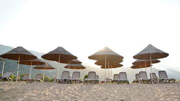 Private beach, sun loungers, beach umbrellas, beach towels