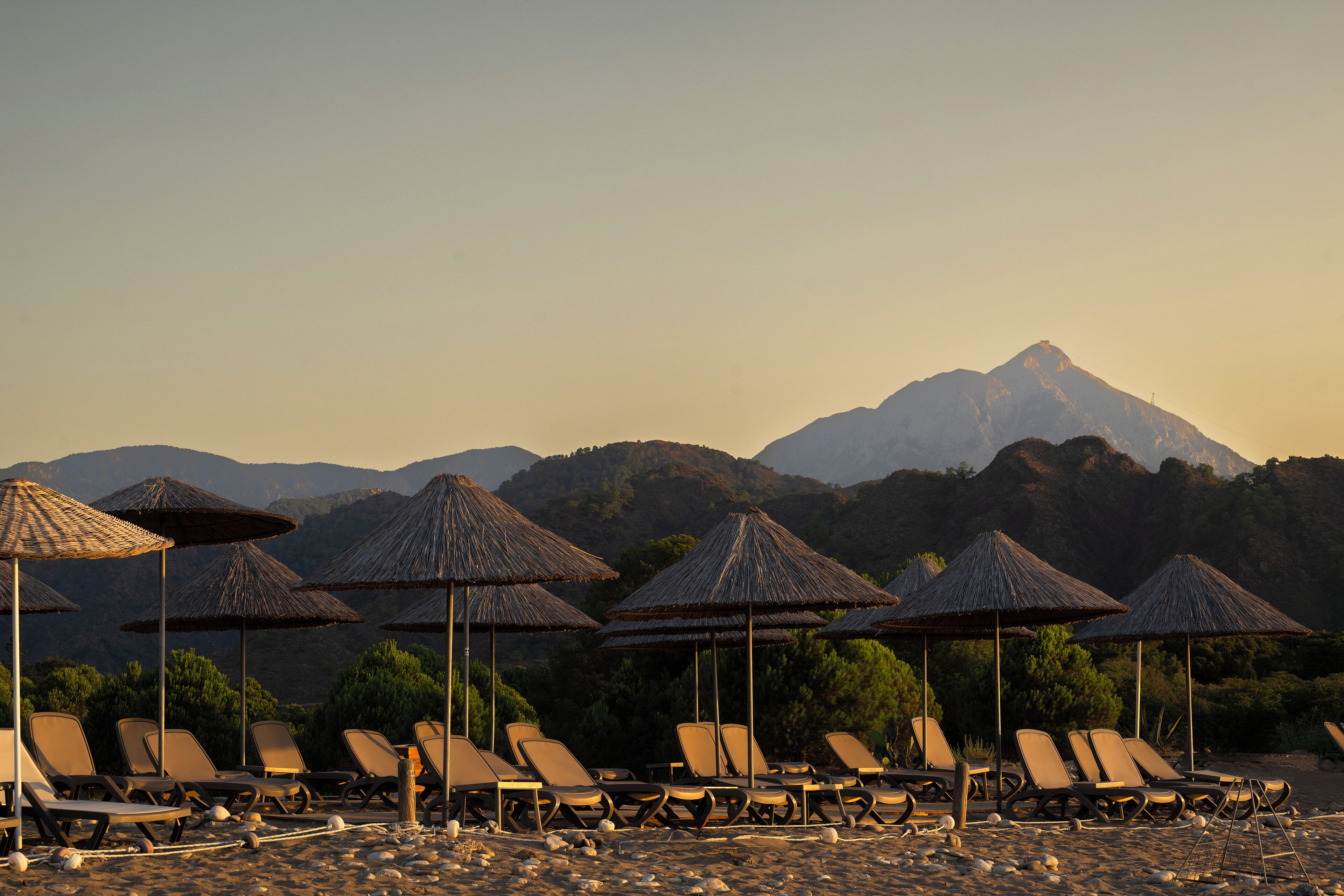 private beach, sun-loungers, beach umbrellas, beach towels