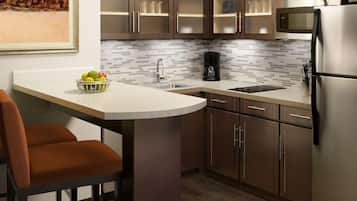 Full-sized fridge, microwave, stovetop, dishwasher