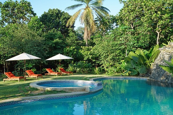 Outdoor pool, free cabanas, pool umbrellas