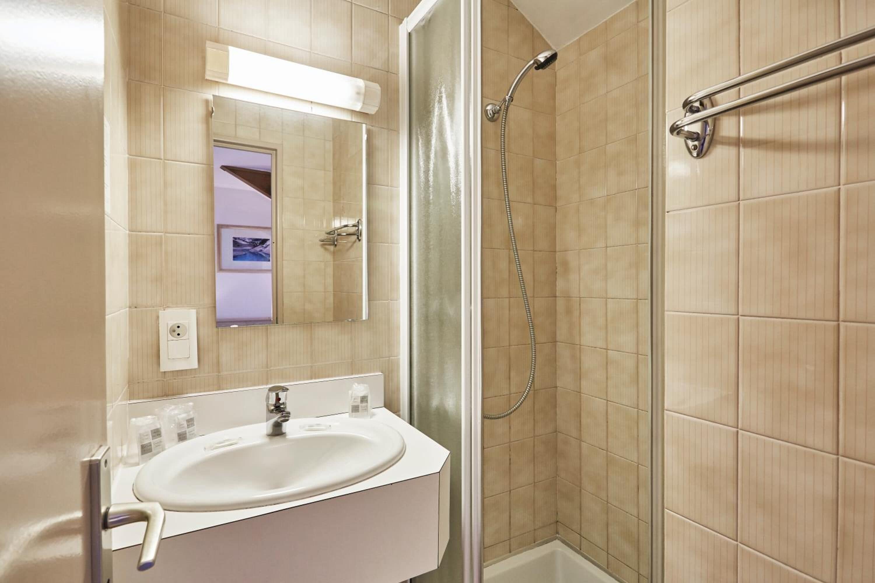 shower, eco-friendly toiletries, hair dryer, towels