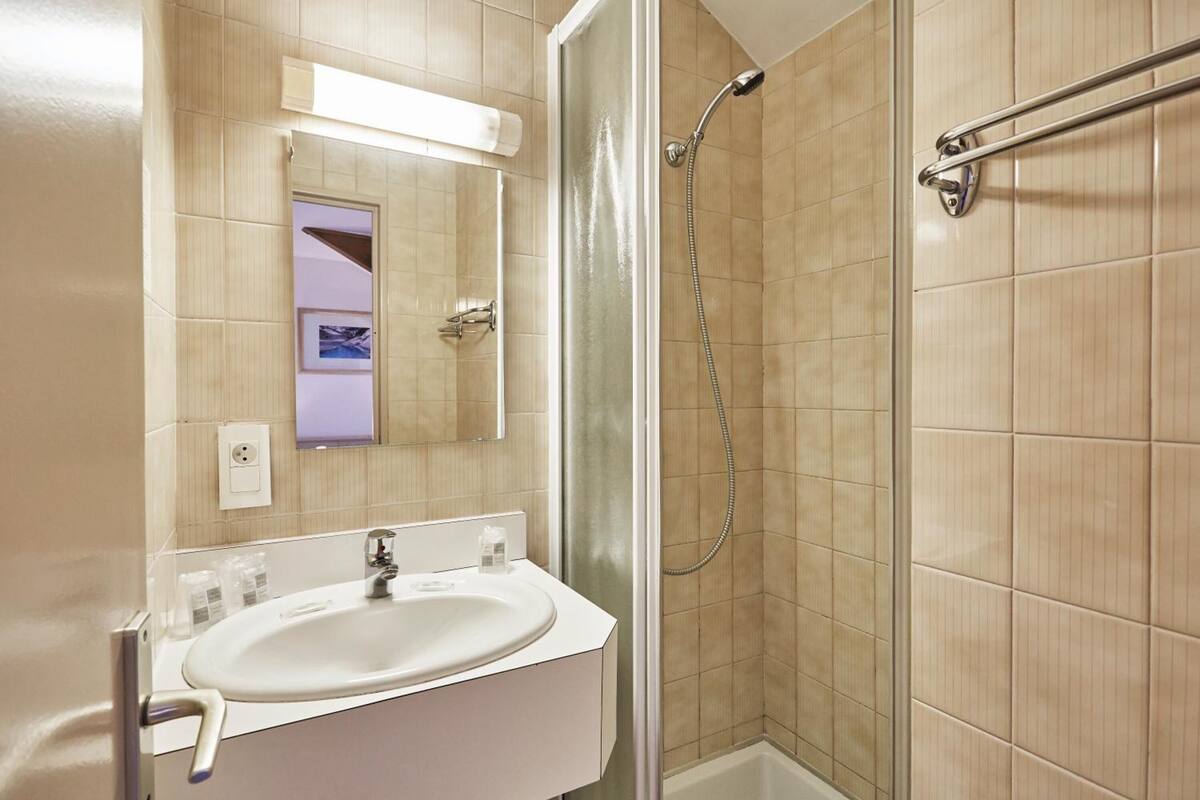 shower, eco-friendly toiletries, hair dryer, towels