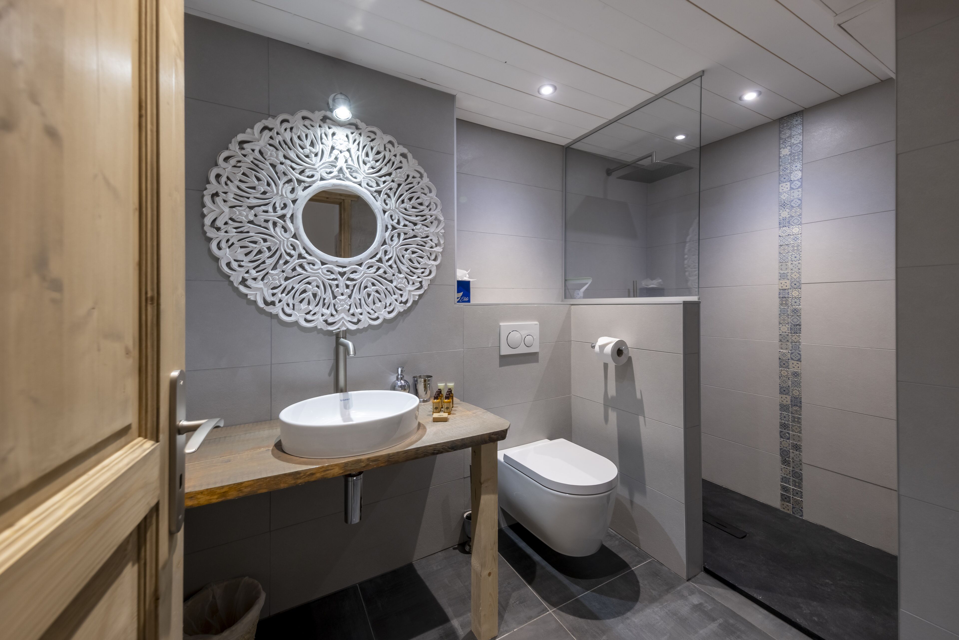 family apartment | bathroom | rainfall showerhead, free toiletries, hair dryer, bathrobes