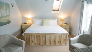 Suite, Kitchenette | Down comforters, iron/ironing board, free WiFi