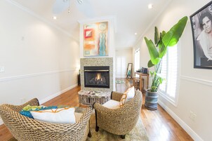 Deluxe Suite, 1 King Bed, Fireplace (Lottie) | Living area | Flat-screen TV