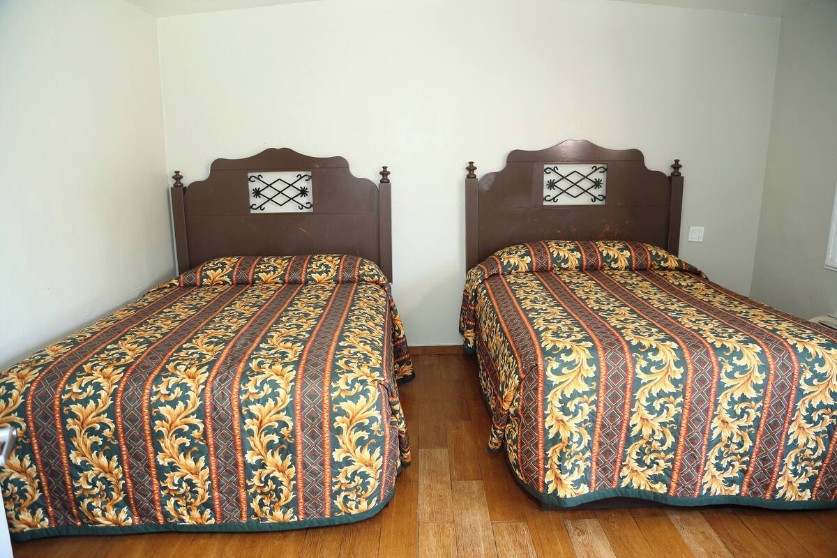 Desk, laptop workspace, free WiFi, bed sheets