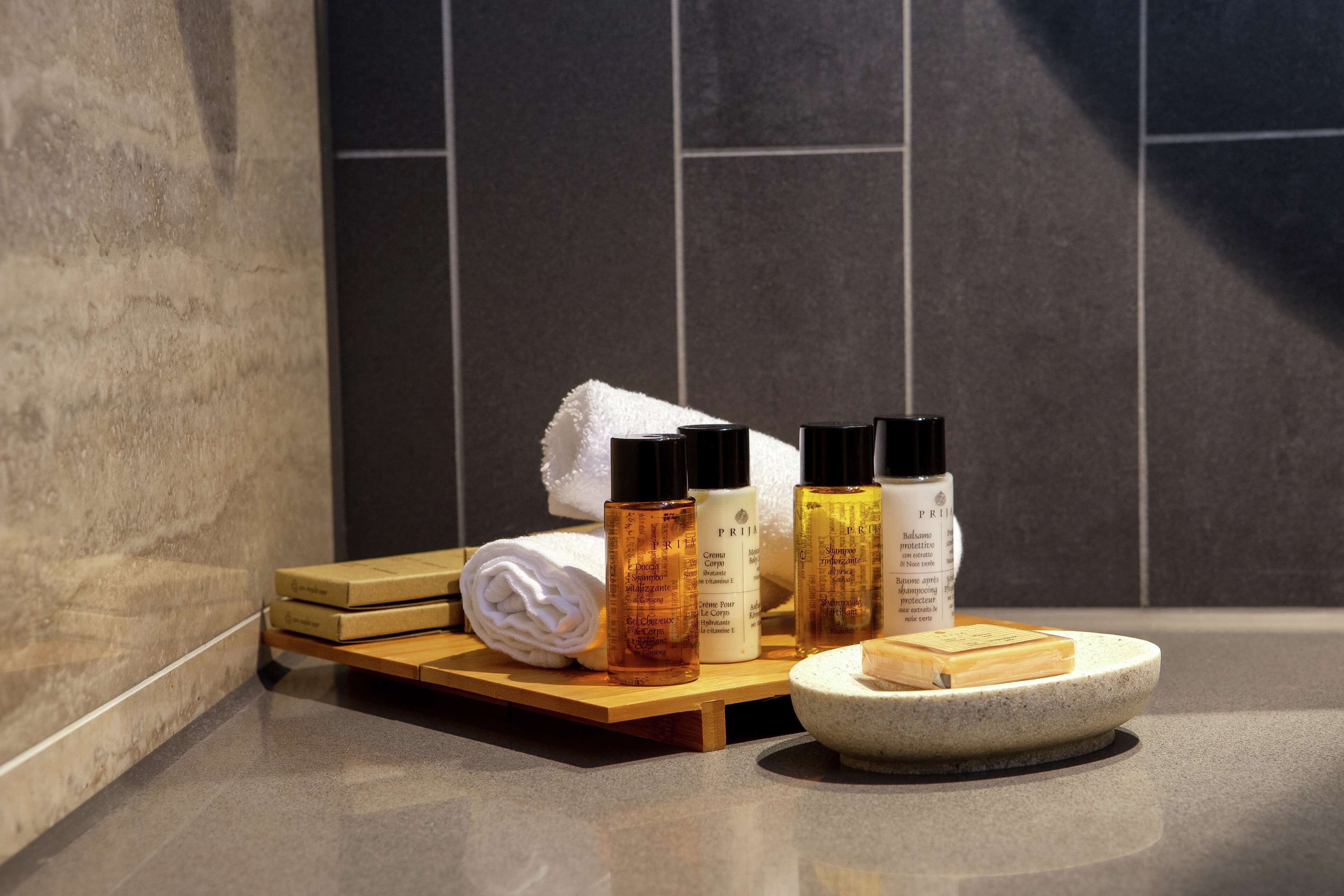 design suite, 1 king bed (vegan) - lounge access | bathroom | rainfall showerhead, free toiletries, hair dryer, towels