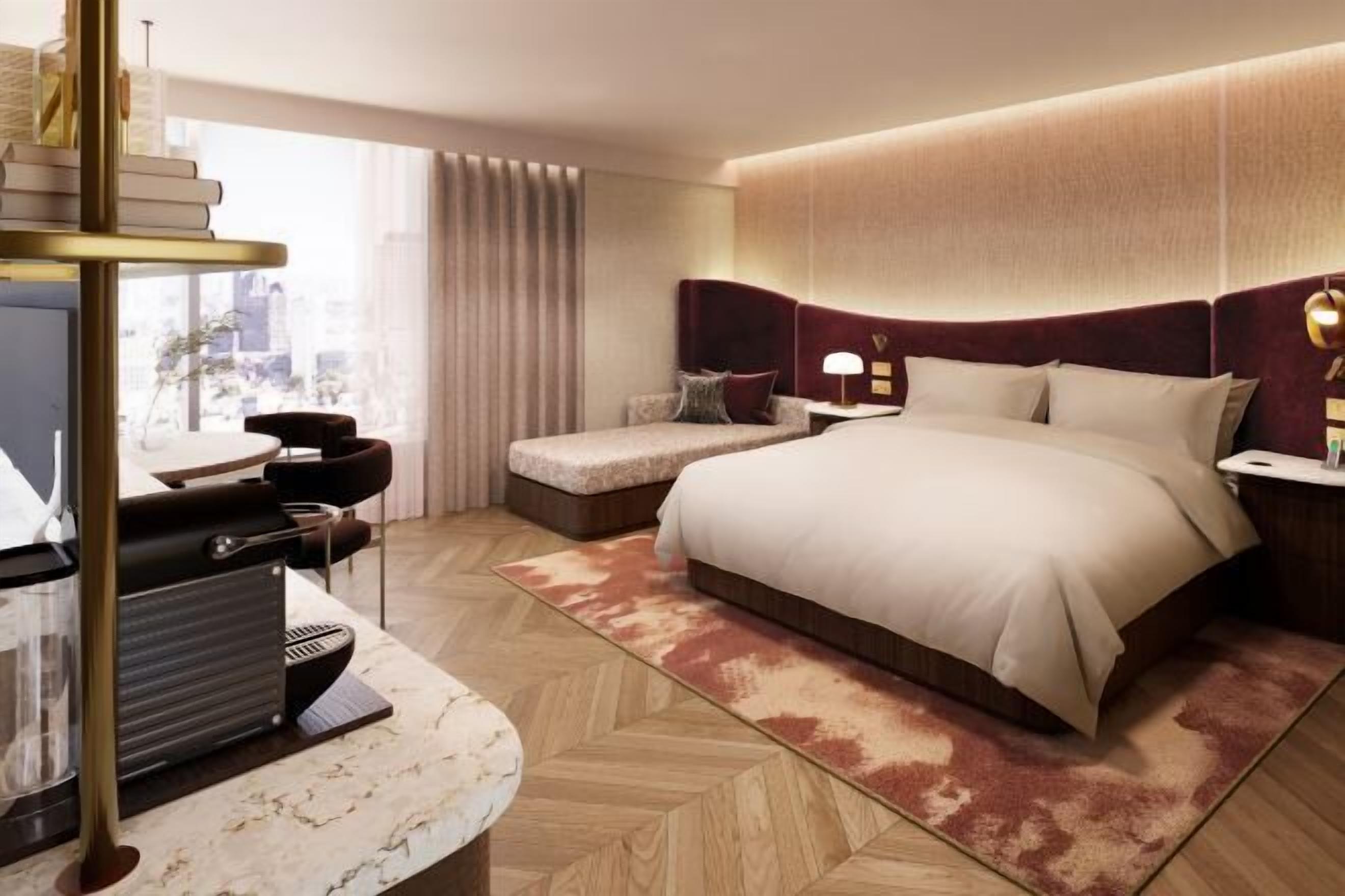 Ylelliset vuodevaatteet, tallelokero huoneessa, työpöytä