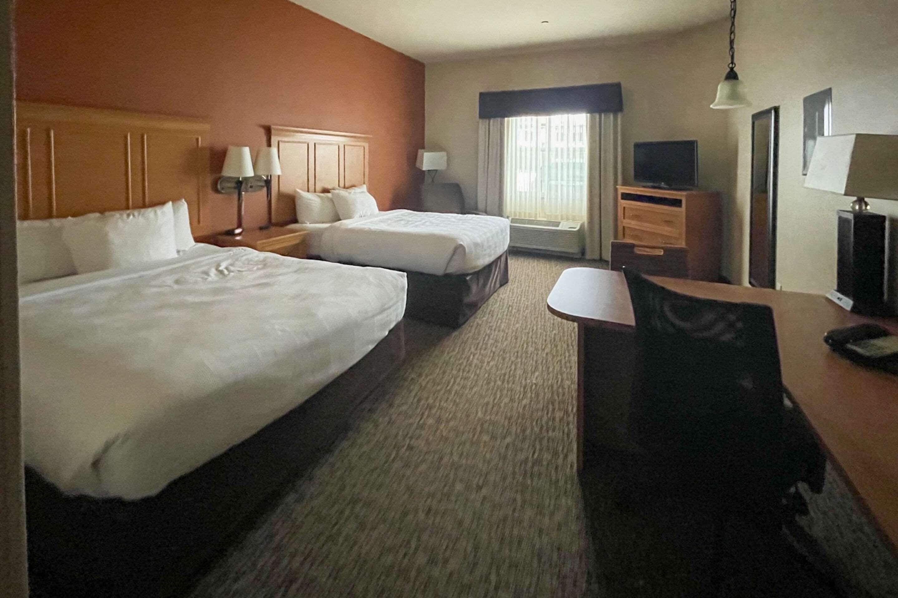 premium bedding, desk, iron/ironing board, rollaway beds