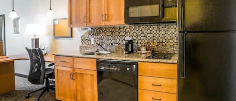 Suite, 1 King Bed | Private kitchenette | Fridge, microwave, stovetop, dishwasher