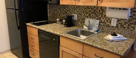 Suite, 2 Queen Beds | Private kitchenette | Fridge, microwave, stovetop, dishwasher