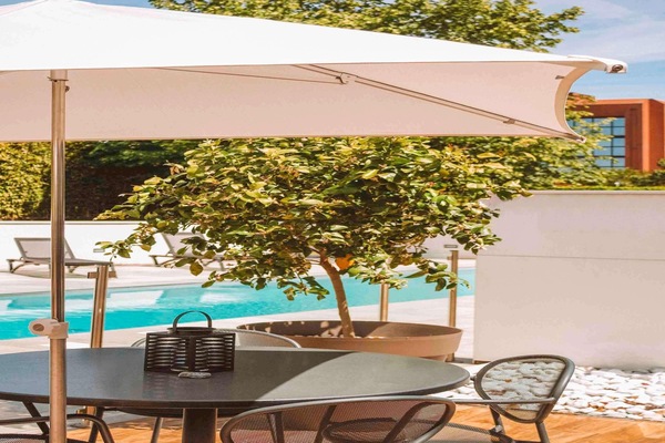 Outdoor pool, open 8:00 AM to 10:00 PM, sun loungers