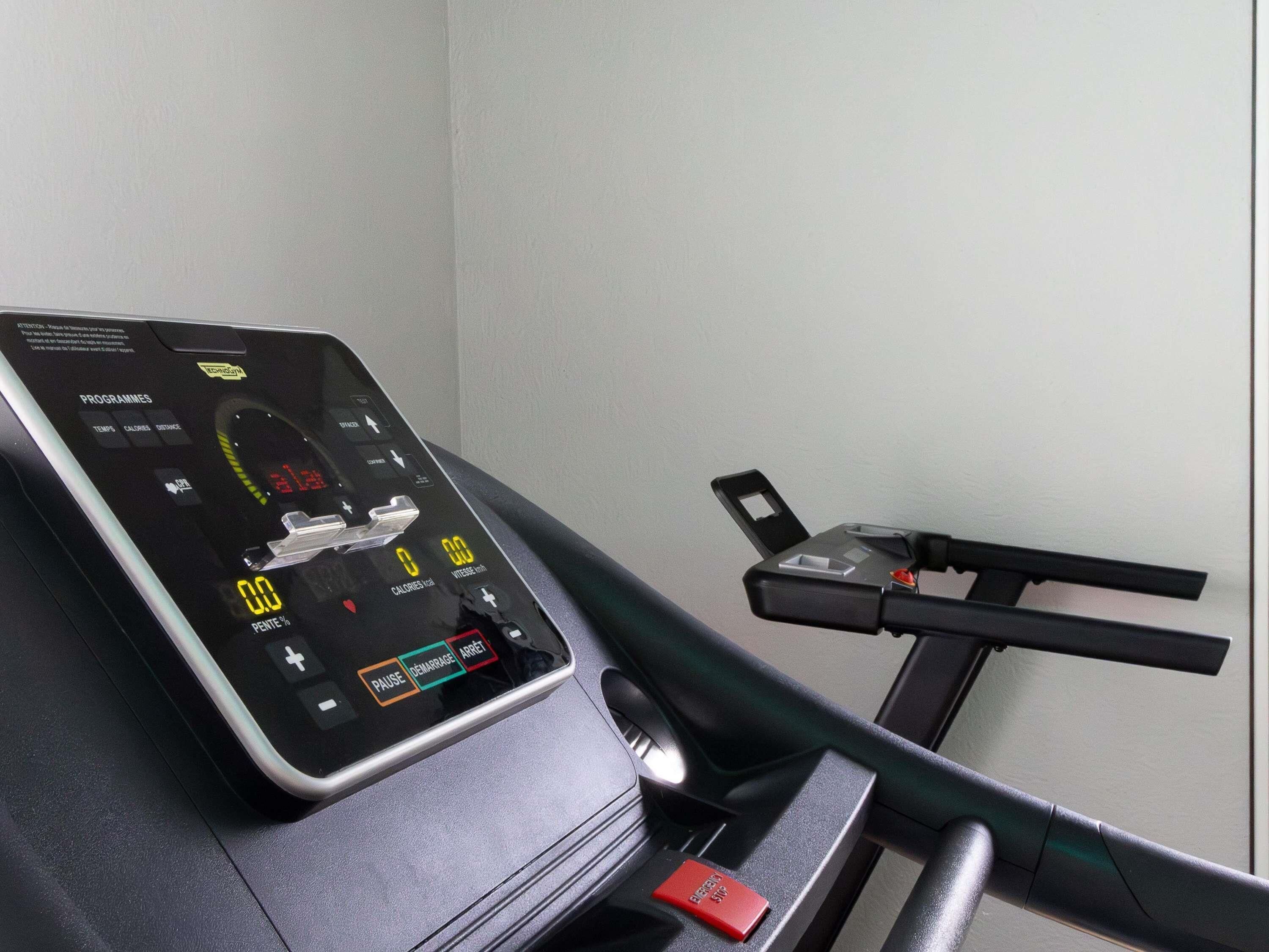 A stationary bike with a digital display and control panel.