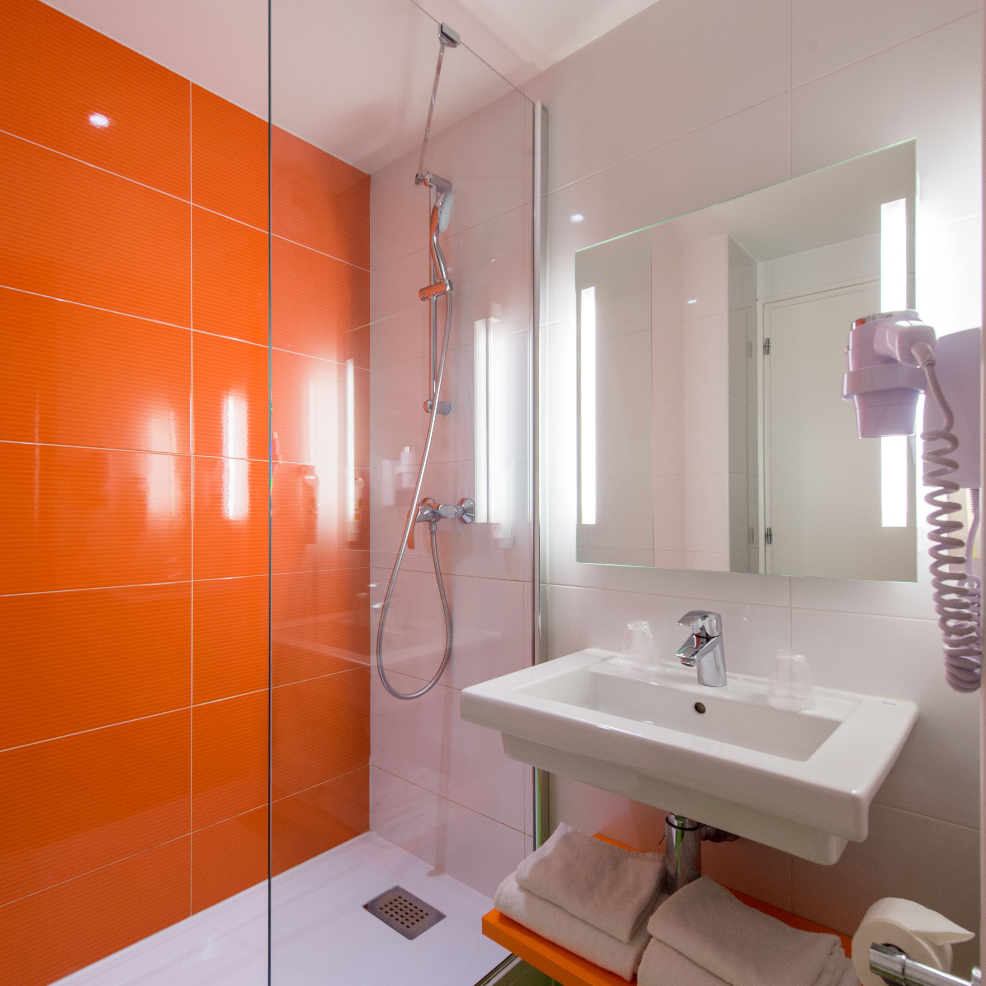 shower, eco-friendly toiletries, hair dryer, towels