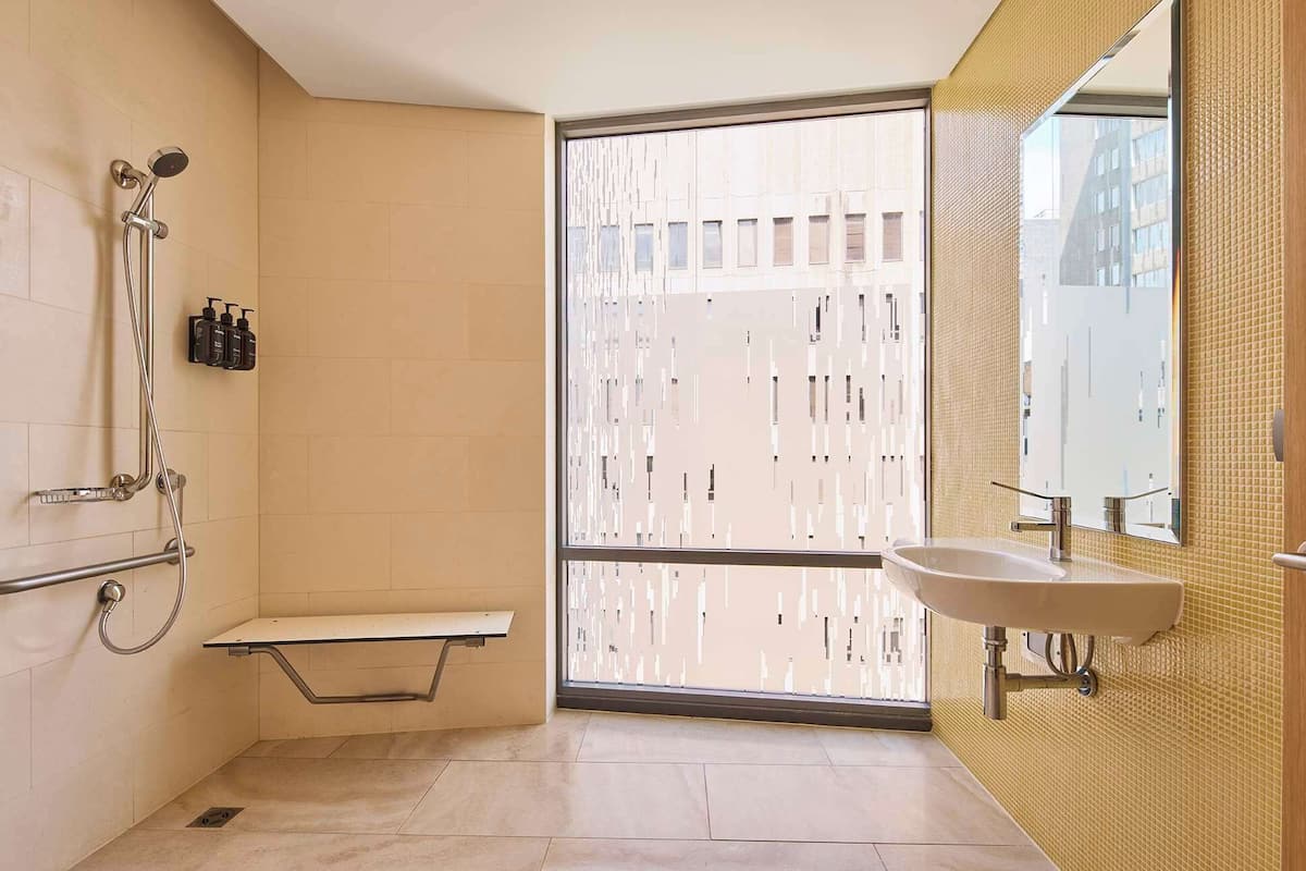 Room, 1 Queen Bed | Bathroom | Shower, designer toiletries, hair dryer, towels