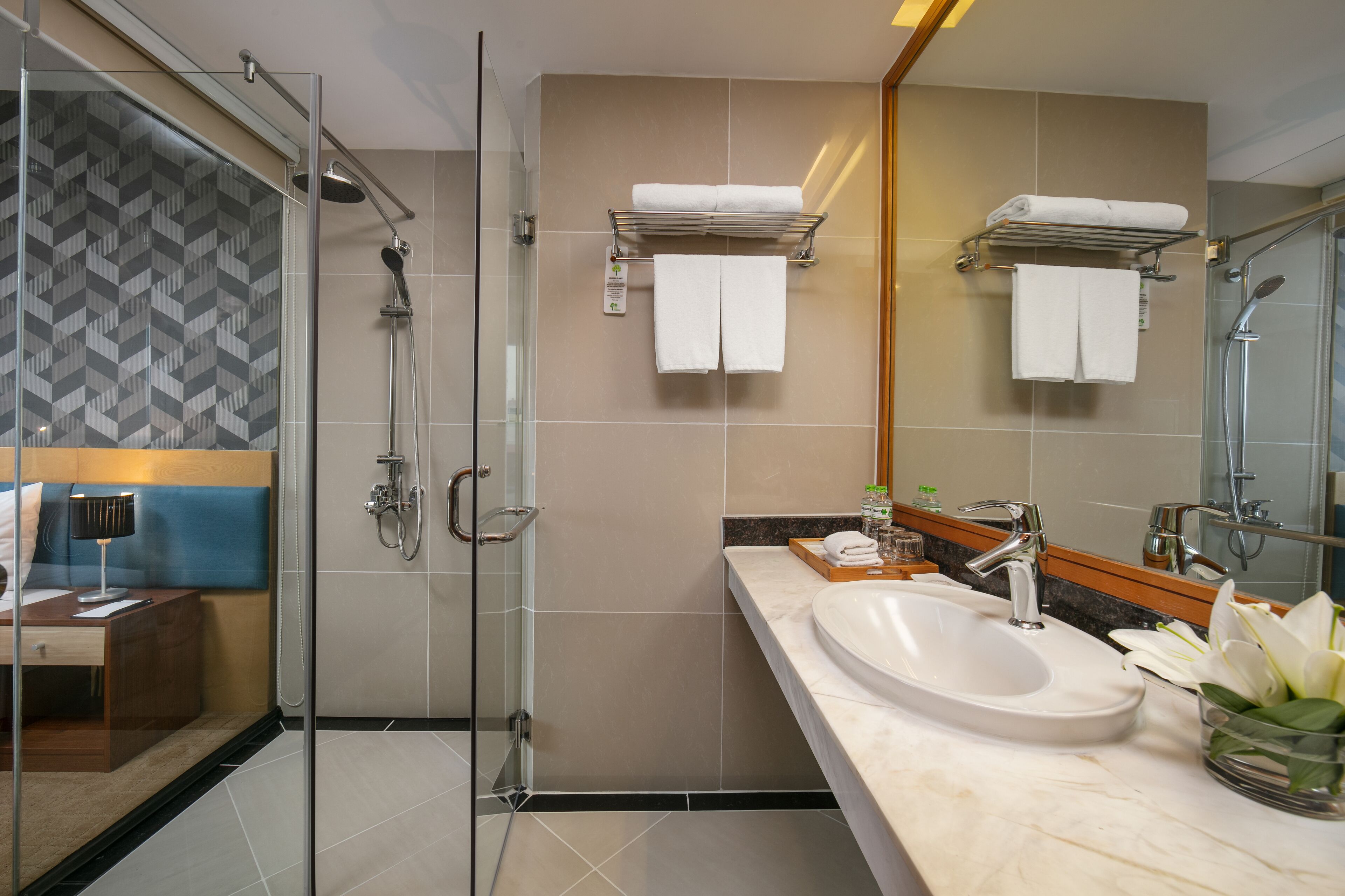 deluxe room | bathroom | free toiletries, hair dryer, slippers, towels