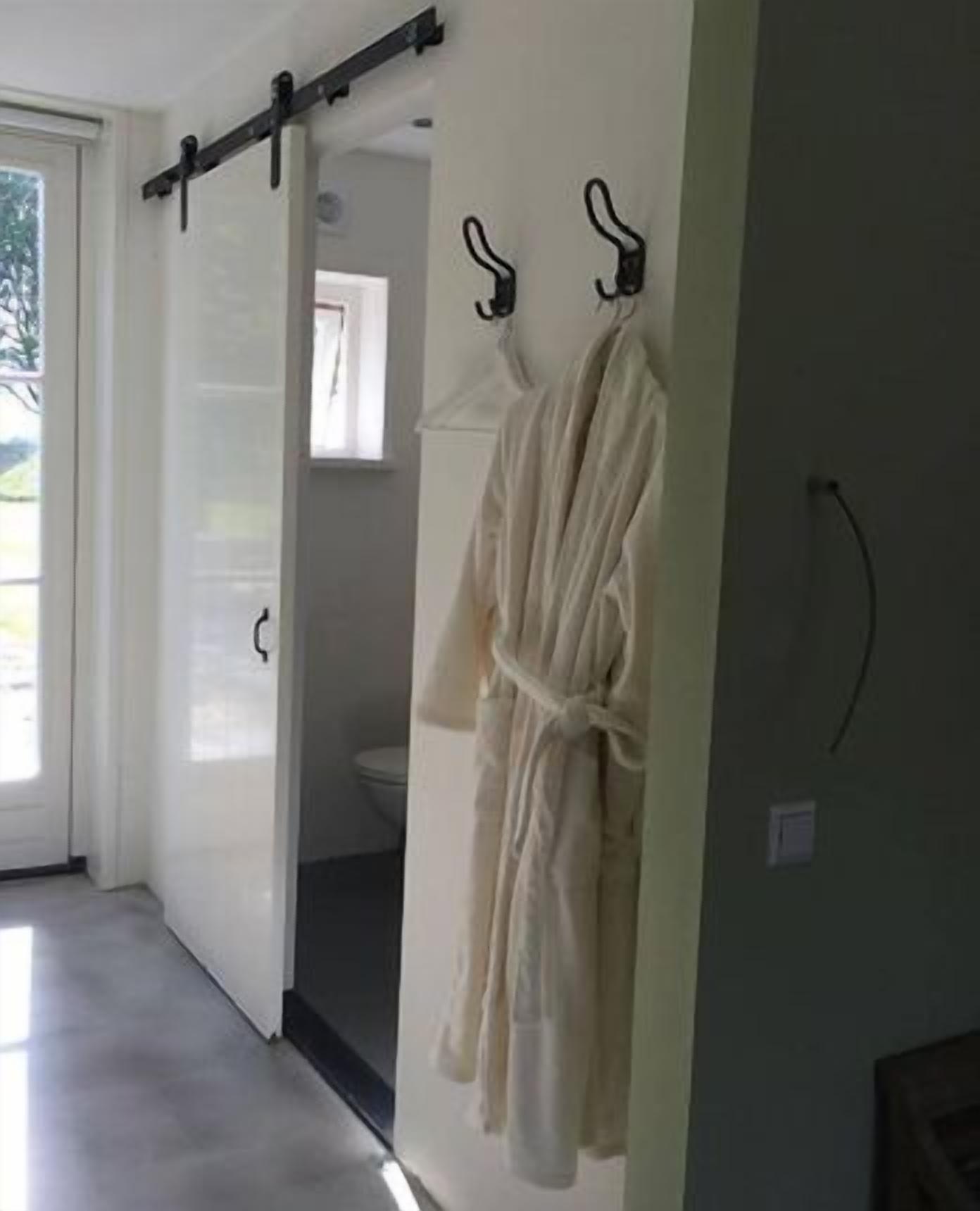 apartment, 1 bedroom, garden area | bathroom amenities | shower, free toiletries, slippers, towels