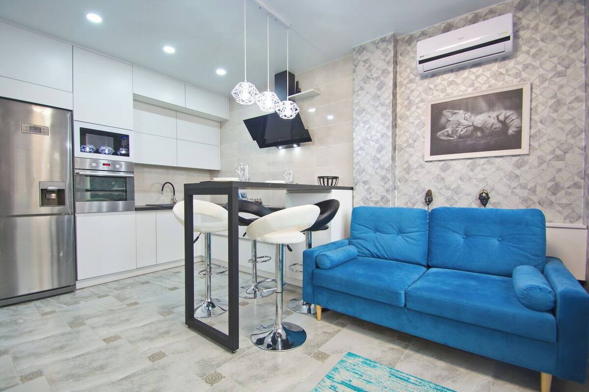 Tabla de planchar con plancha, wifi gratis y decoración personalizada 