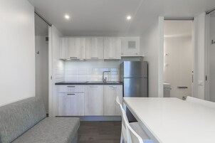 Villa Platinum | Living area | 28-inch TV with satellite channels