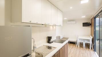 Fridge, stovetop, cookware/dishes/utensils