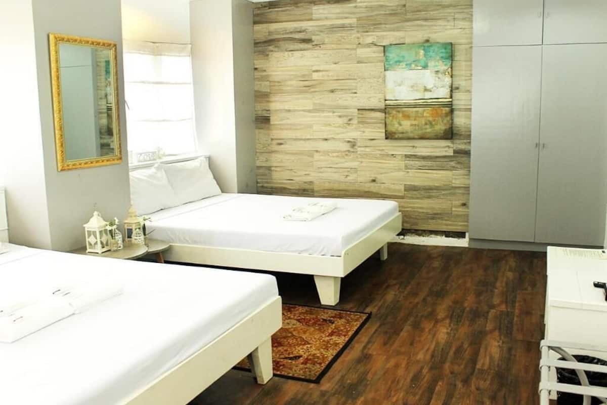 Premium bedding, down duvets, in-room safe, desk