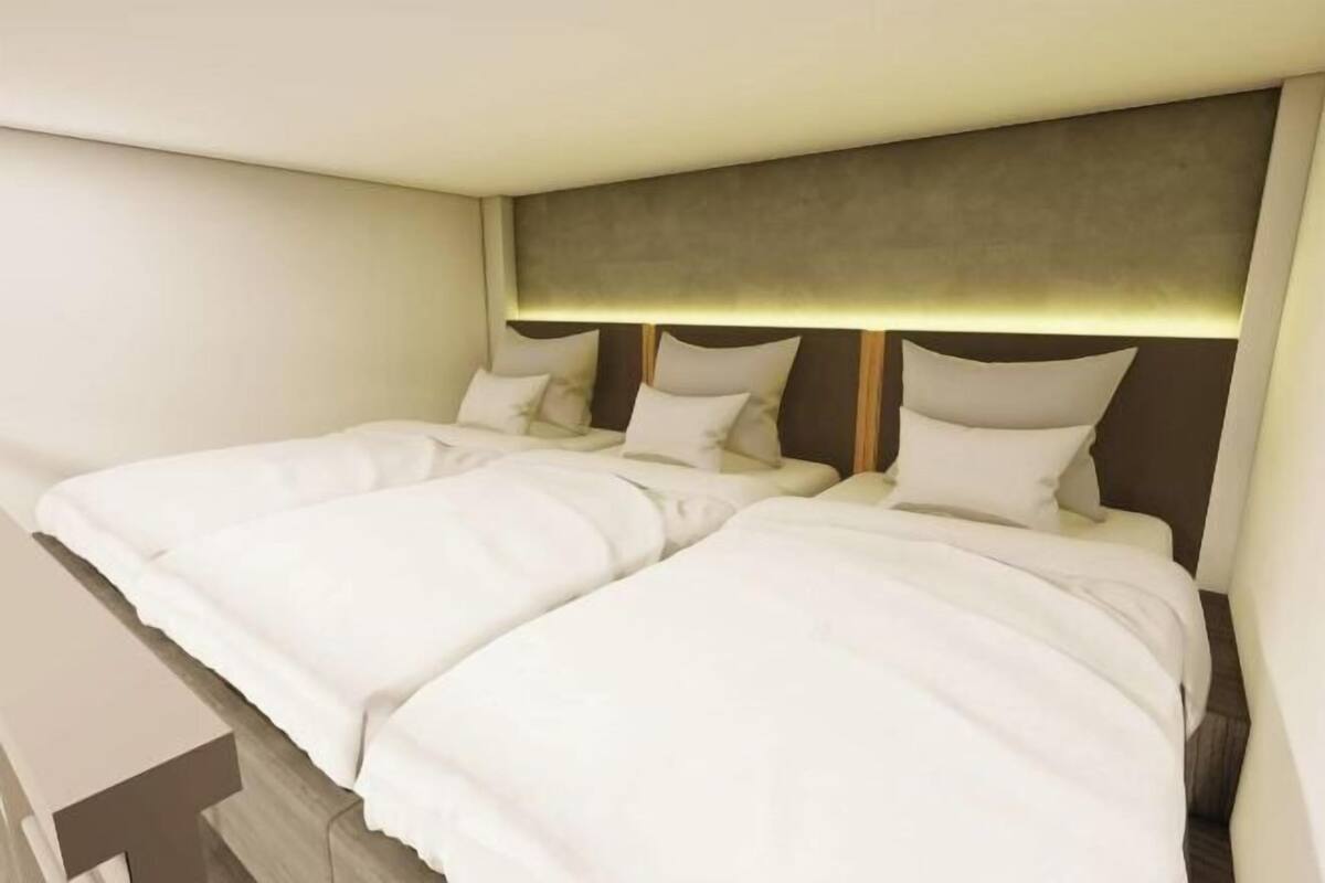 Roupas de cama premium, edredons de pluma, cofres nos quartos