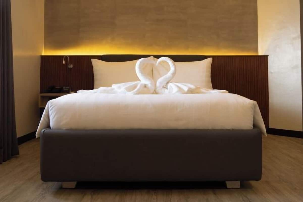 Premium bedding, down duvets, in-room safe, desk