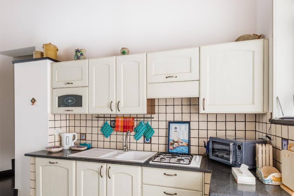 standard double room (casa pascucci) | living area | flat-screen tv