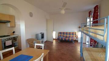 Studio (4 adults) | Living area | Flat-screen TV