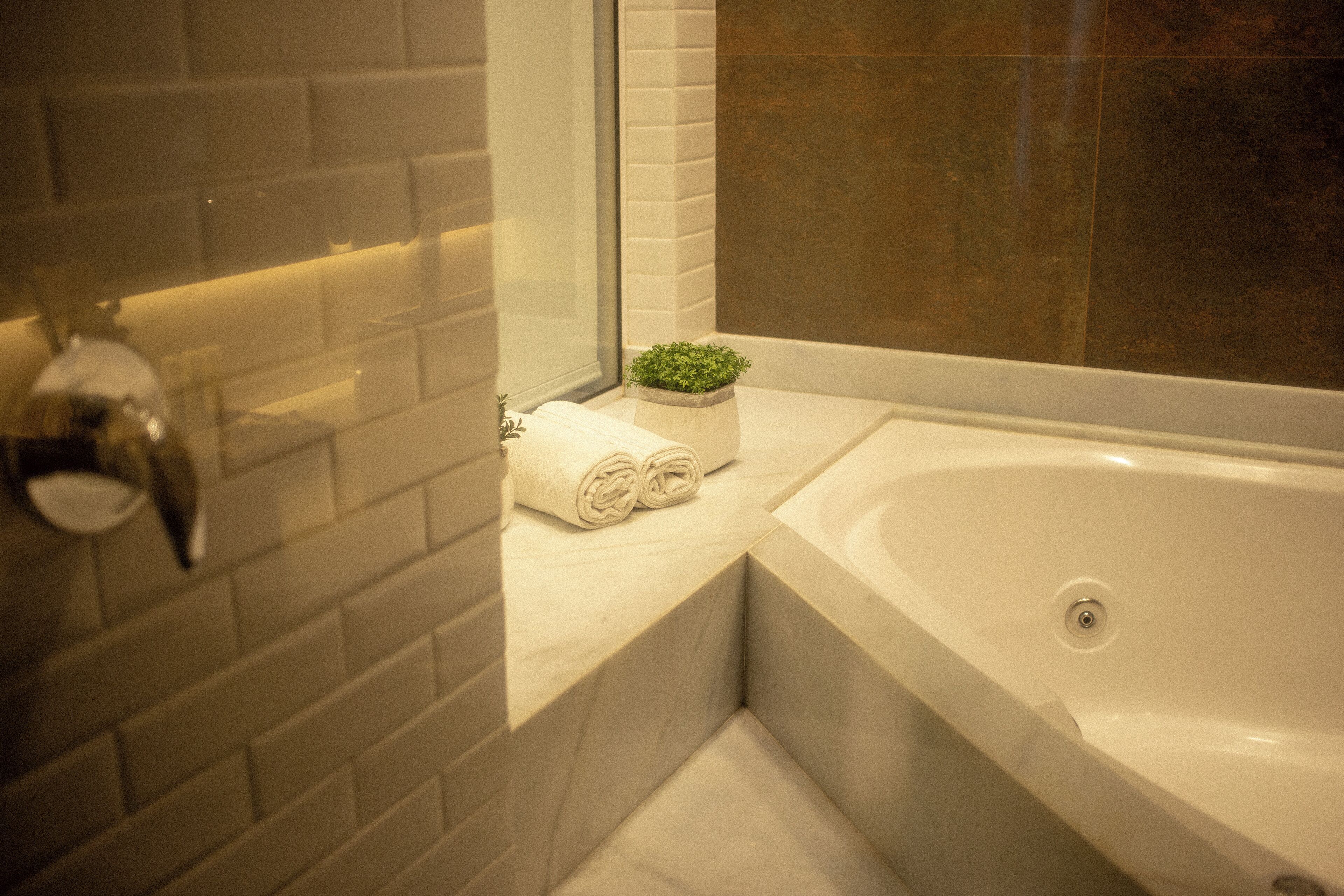 premium suite | bathroom | shower, free toiletries, hair dryer, towels