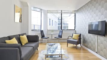 Classic Apartment | Living area | 40-inch flat-screen TV with digital channels, TV