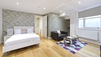 Studio Apartment - Lower Ground Floor | Living area | 40-inch flat-screen TV with digital channels, TV