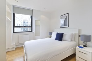 Apartamento clássico | Roupas de cama premium, cofres nos quartos