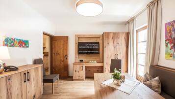 Apartment, 1 Bedroom, Balcony, Mountain View (Beatrice) | Living room | Flat-screen TV