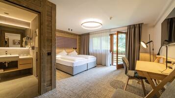 Suite familiare (Wiese) | Biancheria da letto ipoallergenica, minibar, una cassaforte in camera