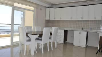 Fridge, stovetop, cookware/dishes/utensils