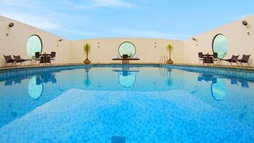 Outdoor pool, open 8:00 AM to 10:00 PM, sun loungers
