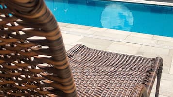 Outdoor pool, open 8:00 AM to 10:00 PM, sun loungers