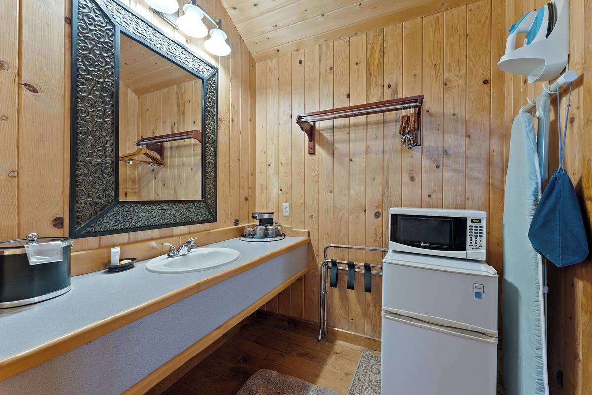 combined shower/bathtub, hair dryer, towels, soap