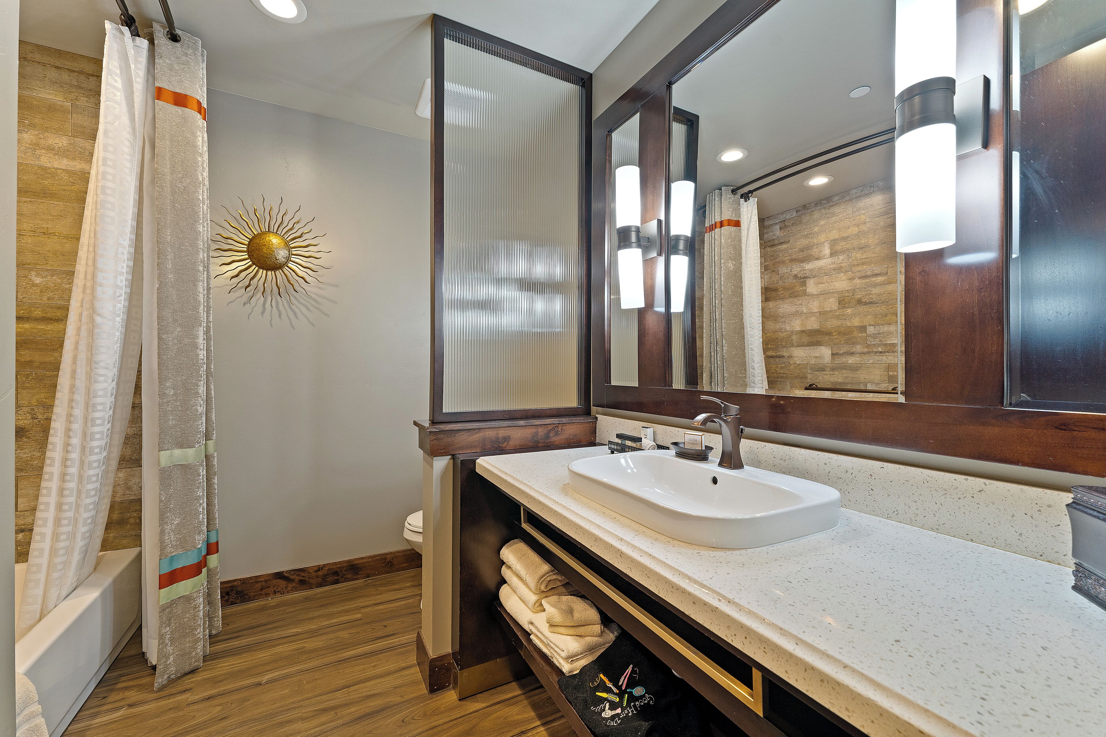 combined shower/bathtub, hair dryer, towels, soap