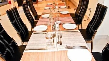 Breakfast, lunch, dinner served; local cuisine