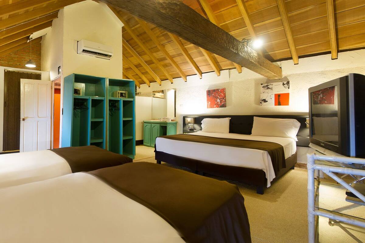 Standard Quadruple Room, 1 Bedroom | In-room safe, blackout drapes, WiFi (free)