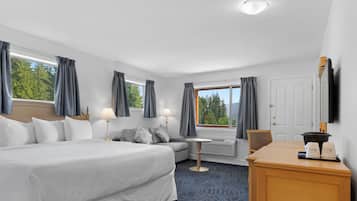 Premium bedding, pillow-top beds, desk, laptop workspace