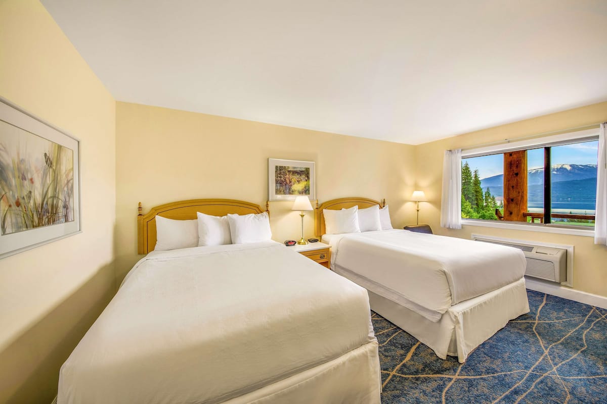 standard room, 2 queen beds, non smoking, lake view | premium bedding, desk, laptop workspace, soundproofing