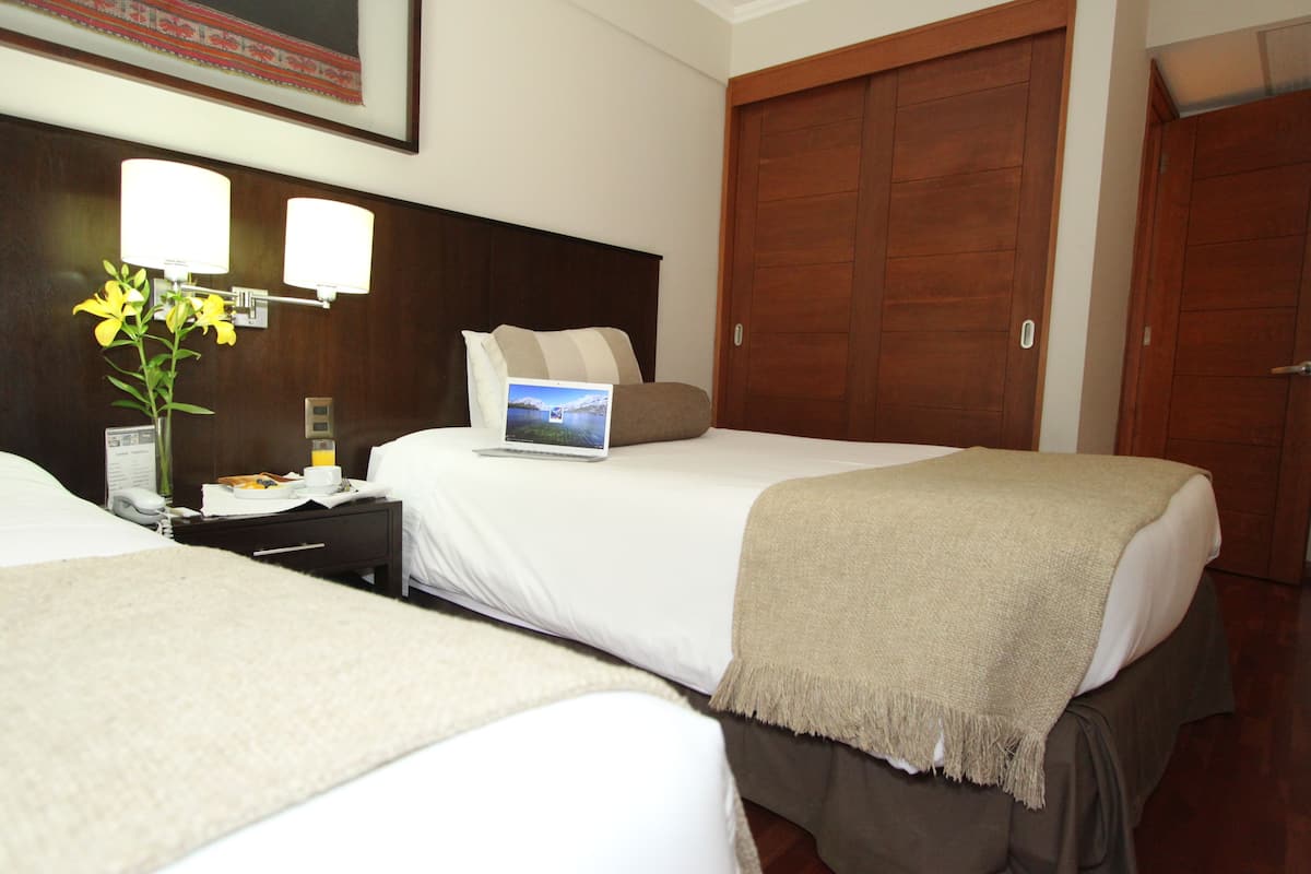 Standard Room, 2 Queen Beds | In-room safe, desk, rollaway beds, free WiFi