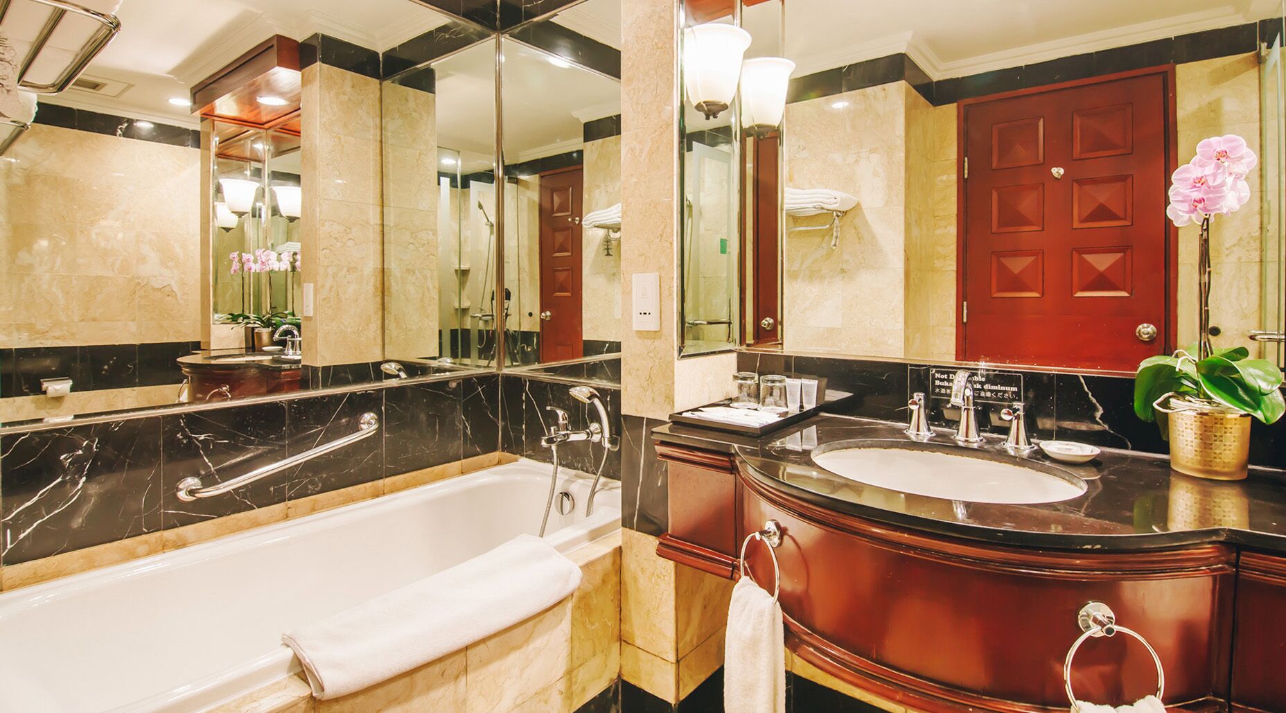 separate bathtub and shower, free toiletries, hair dryer, slippers