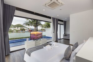 Familienvilla, 4 Schlafzimmer | Minibar, Zimmersafe, Verdunkelungsvorhänge, schallisolierte Zimmer