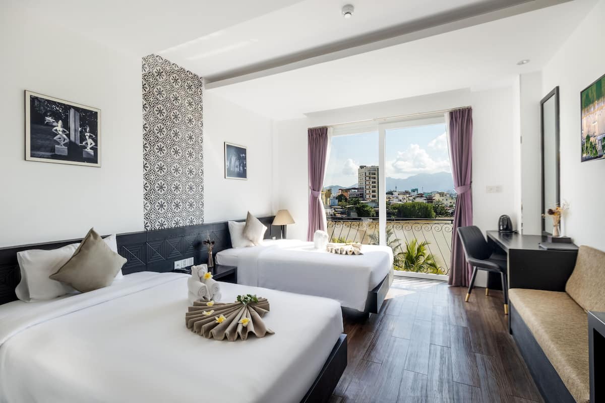 2 habitaciones, minibar y caja de seguridad en la habitación